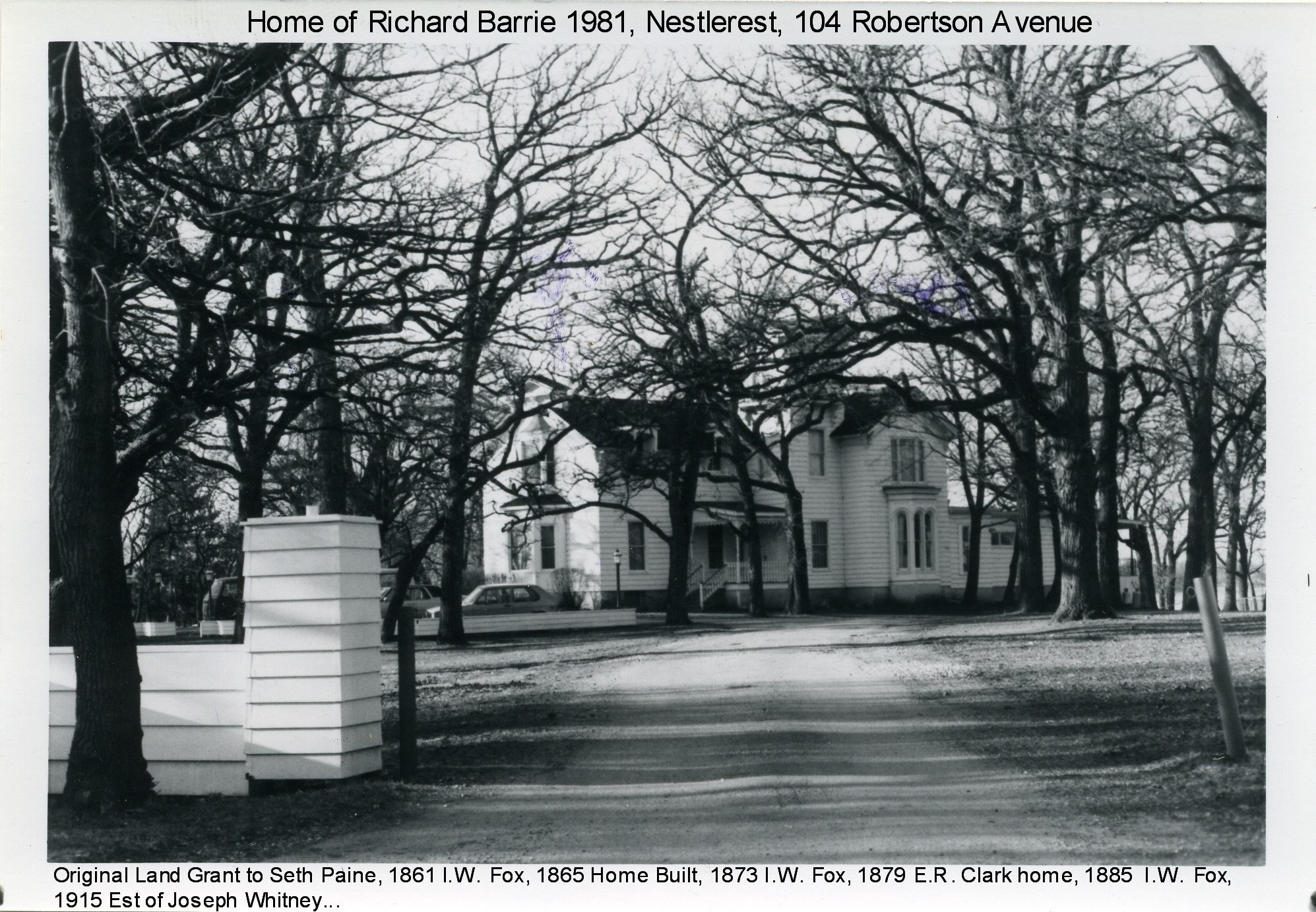 The Nestlerest house in winter 1981, seen down a drive between bare oaks, with typed captions above and below
